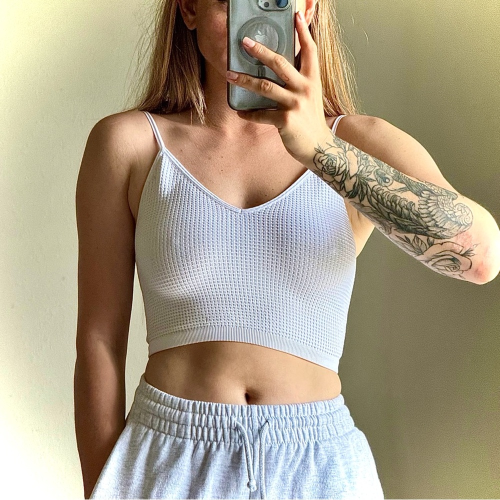 Top, white, size medium, stretches, worn a couple of times
